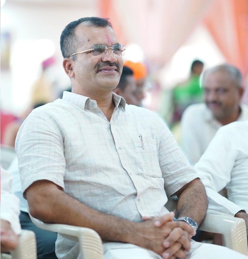 Chairman sitting at a desk